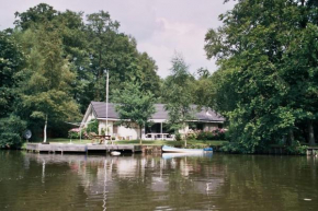Comfortabele woning aan het water, hottub & kachel